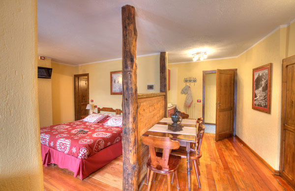 Zona pranzo e zona letto Zona pranzo e zona letto